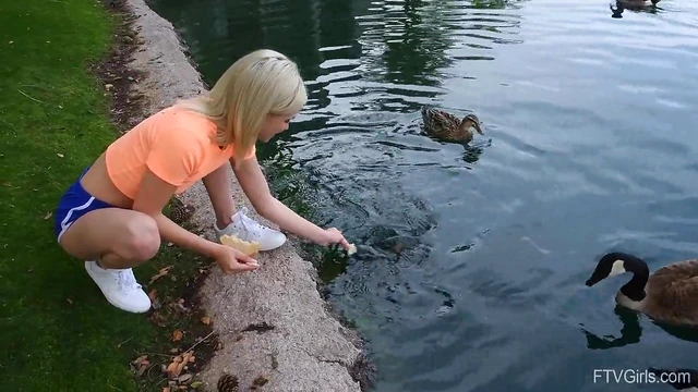 Outdoor Temptation: Flexible Blonde Kiara Teasingly Spreads Her Legs