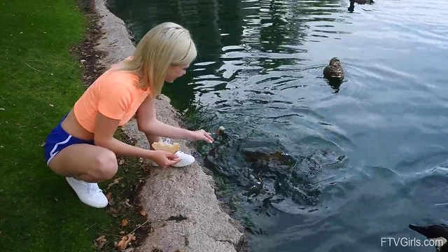 Outdoor Temptation: Flexible Blonde Kiara Teasingly Spreads Her Legs