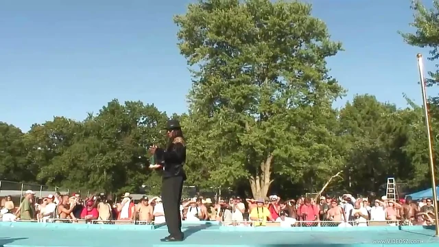 Naked Girls Pose Boldly Before Eager Crowd at Public Contest Event