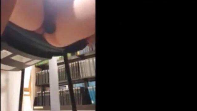 College Coed Uses Dildo Quietly in Library Corner For Self-Pleasure