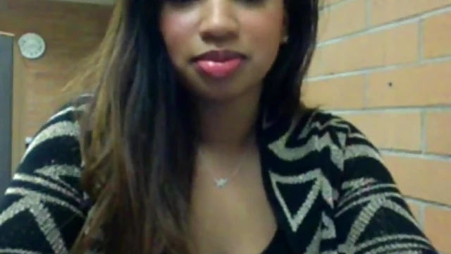 Sultry Ebony Tempts Desires in Public Restroom Encounter