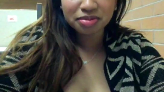 Sultry Ebony Tempts Desires in Public Restroom Encounter