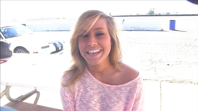 Sensual Petite Babe Reveals Stunning Curves and Teases Crowd Outdoors