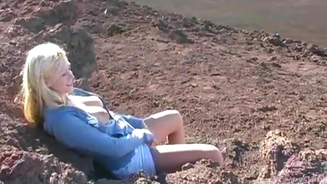 Blonde Beauty Teases Her Wet Pussy Amidst Mountain Scenery Blissfully