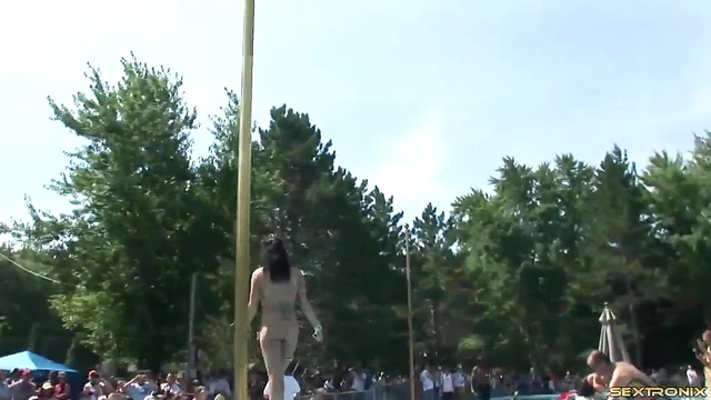 Sultry Tattooed Babe Dances Seductively Outdoors for Erotic Striptease Showdown