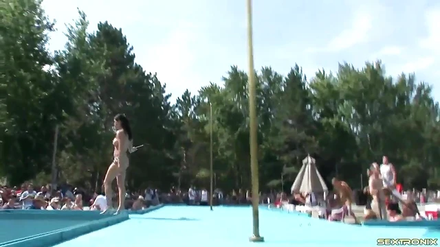 Sultry Tattooed Babe Dances Seductively Outdoors for Erotic Striptease Showdown