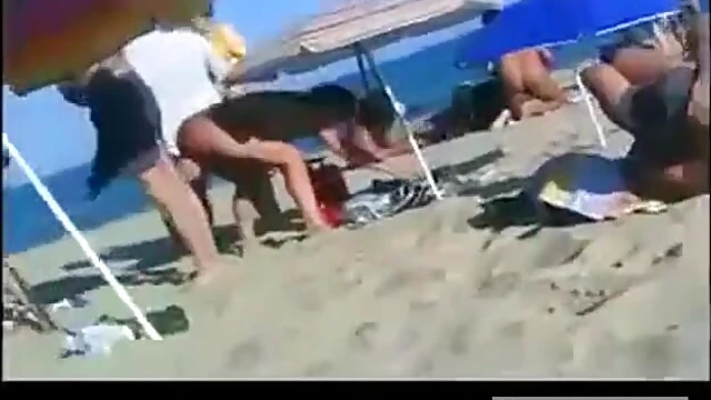 Hot Nudists Sunbathe Intimately While Enjoying Beachside Pleasure Time