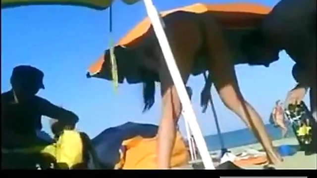 Hot Nudists Sunbathe Intimately While Enjoying Beachside Pleasure Time