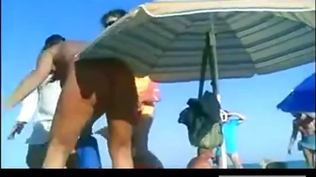 Hot Nudists Sunbathe Intimately While Enjoying Beachside Pleasure Time