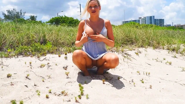 Kacey Shows Off Her Curves While Peeing Outdoors on Sandy Beach