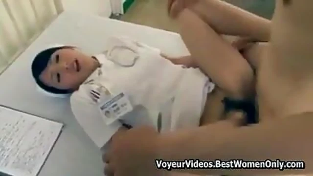 Seductive Japanese Nurse Tempts Patient into Steamy Hospital Bed Action