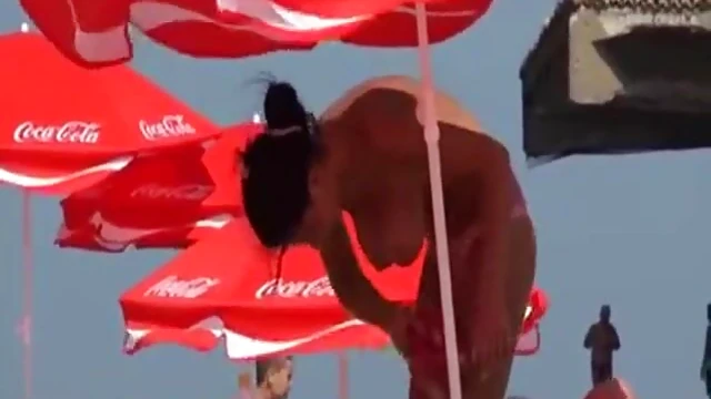 Sexy Beach Babe Gets Tan While Enjoying Sensual Massage Action