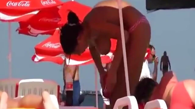 Sexy Beach Babe Gets Tan While Enjoying Sensual Massage Action