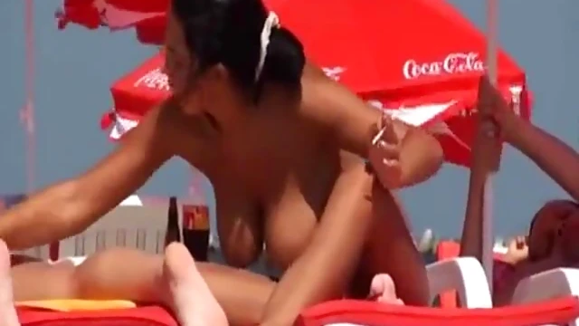 Sexy Beach Babe Gets Tan While Enjoying Sensual Massage Action
