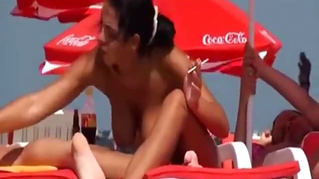 Sexy Beach Babe Gets Tan While Enjoying Sensual Massage Action