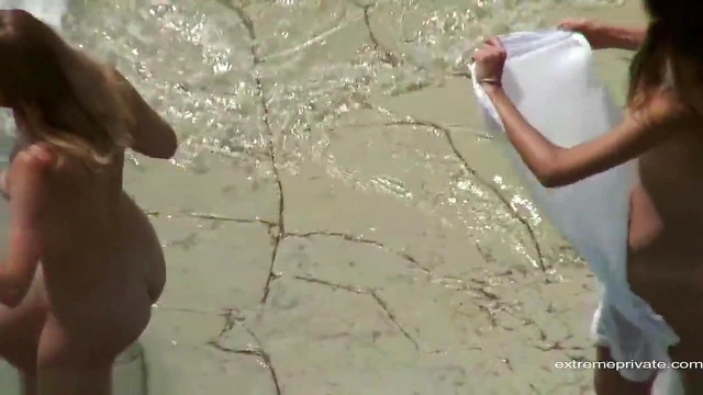 Friends Pose Nude in Surf Waves for Steamy Vacation Moments Together