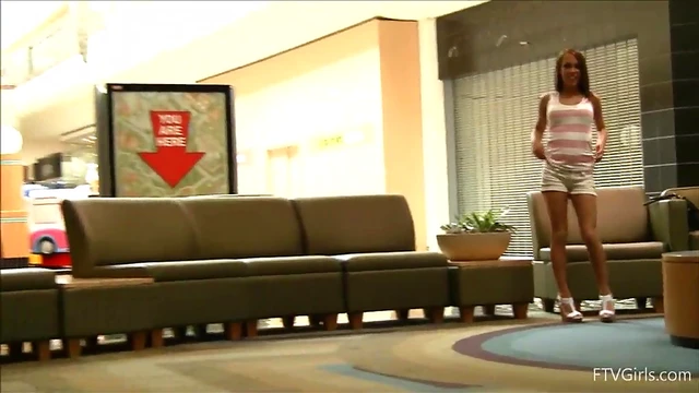 Sultry Brunette Teases Her Pussy Publicly at Busy Mall