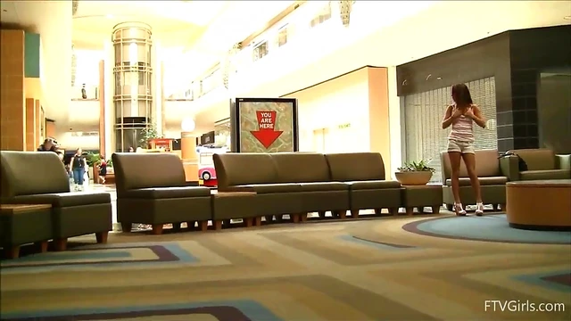 Sultry Brunette Teases Her Pussy Publicly at Busy Mall