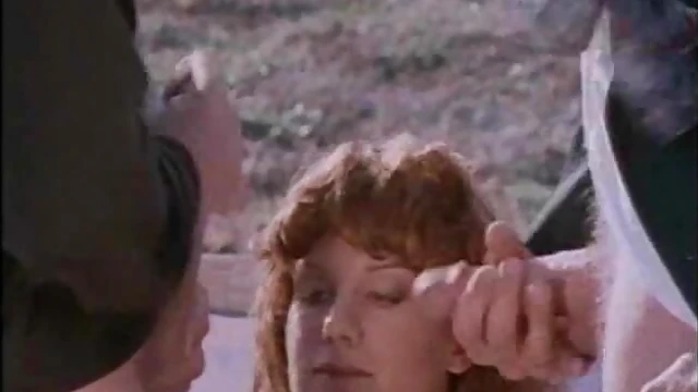 Horny Redhead Tempts Two Men With Her Irresistible Curves