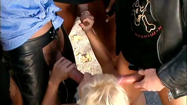 Juicy Blondie Gets Fucked Hard by Raging Biker Gang Members