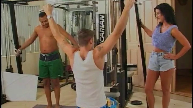 Gym Goddess Seduces Two Studs Into Scorching Threesome Action