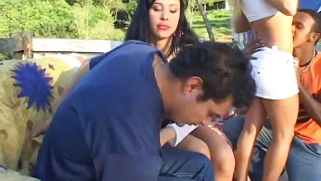 Sexy Cowgirl in Mini Skirt Enjoys Wild Foursome Sex Action