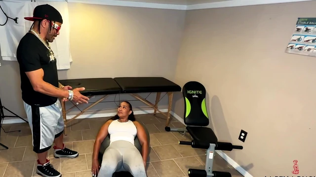 Jim Bones Surprises LaBella During Her Sweat-Drenched Workout Routine