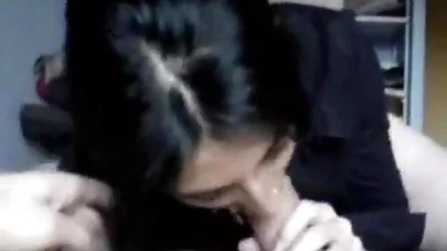 Sultry Black-Haired Beauty Delivers Mind-Bending Blowjob to Her Man