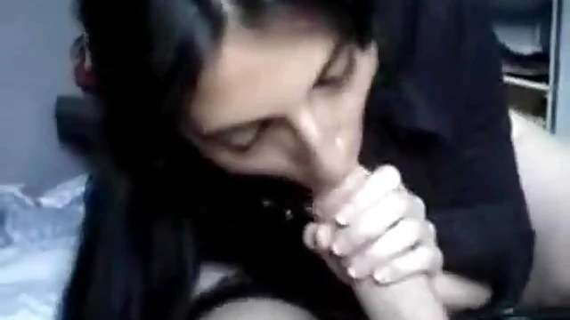 Sultry Black-Haired Beauty Delivers Mind-Bending Blowjob to Her Man