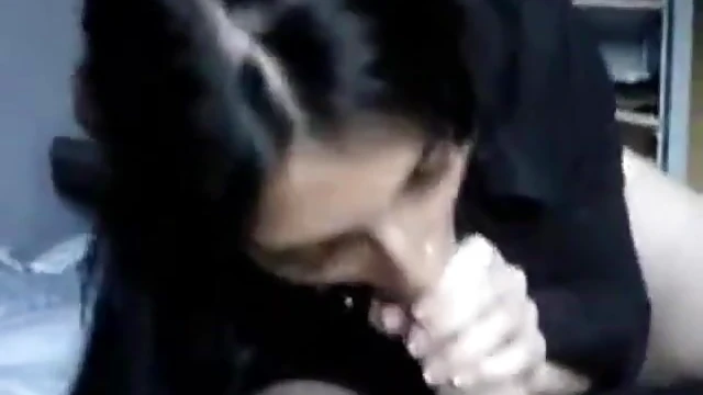 Sultry Black-Haired Beauty Delivers Mind-Bending Blowjob to Her Man